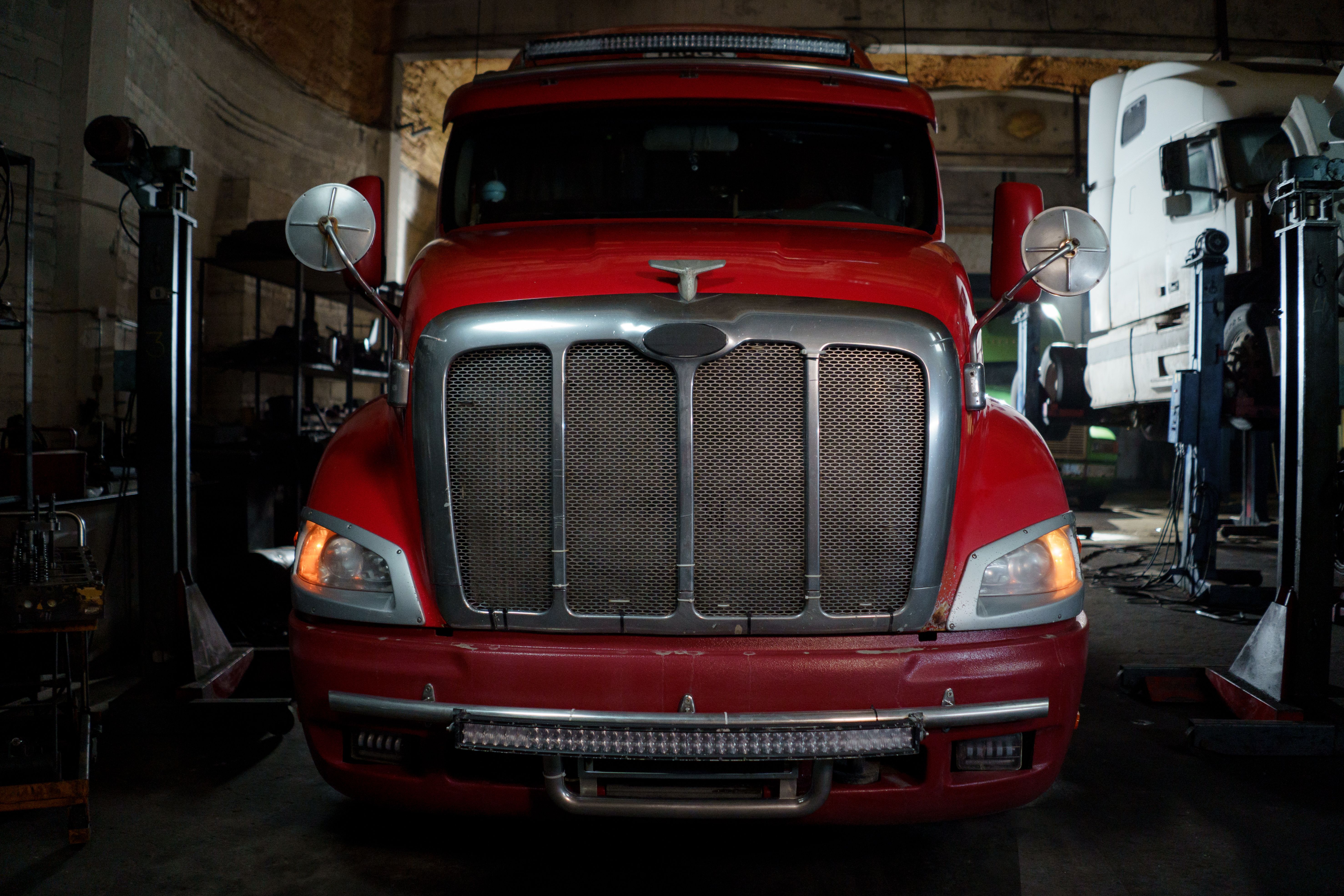 Fleet of trucks in service lot